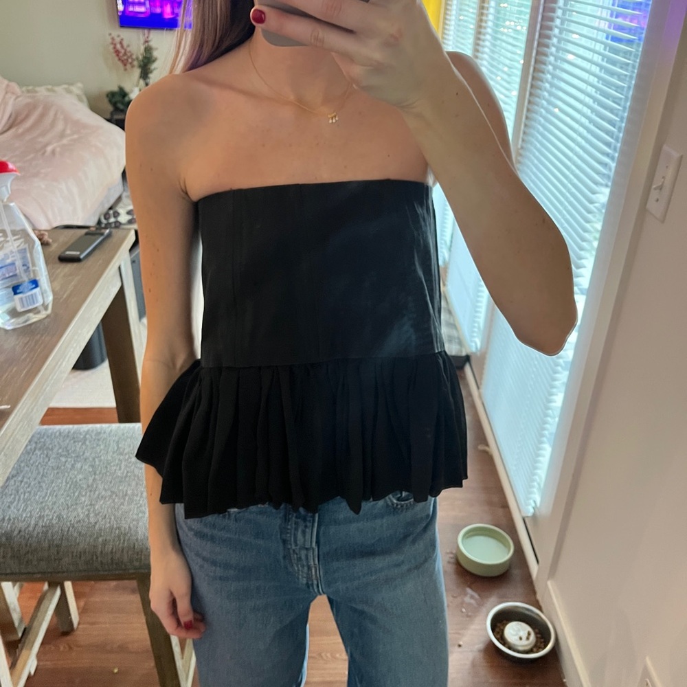 Black strapless peplum top
